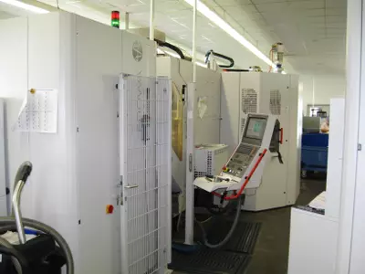 C30U 5-Achsen Fräsmaschine mit EROWA Palettenwechsler