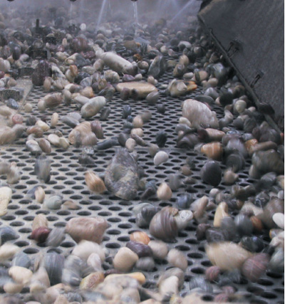 Perforated metal for vibrating screening machines and trommels