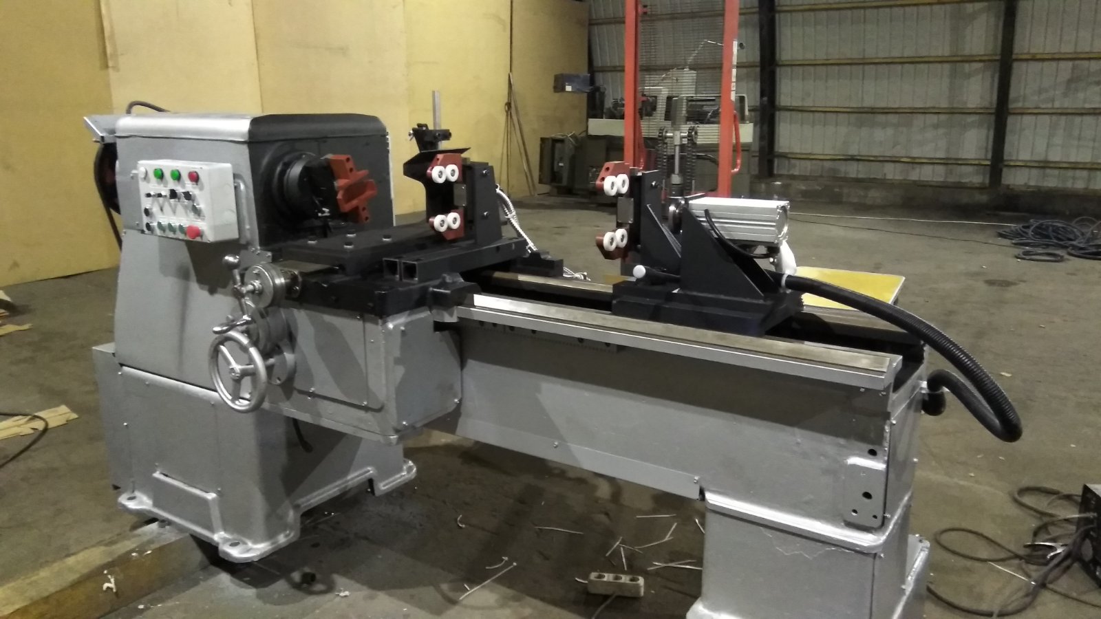 Machine for welding rods to lugs