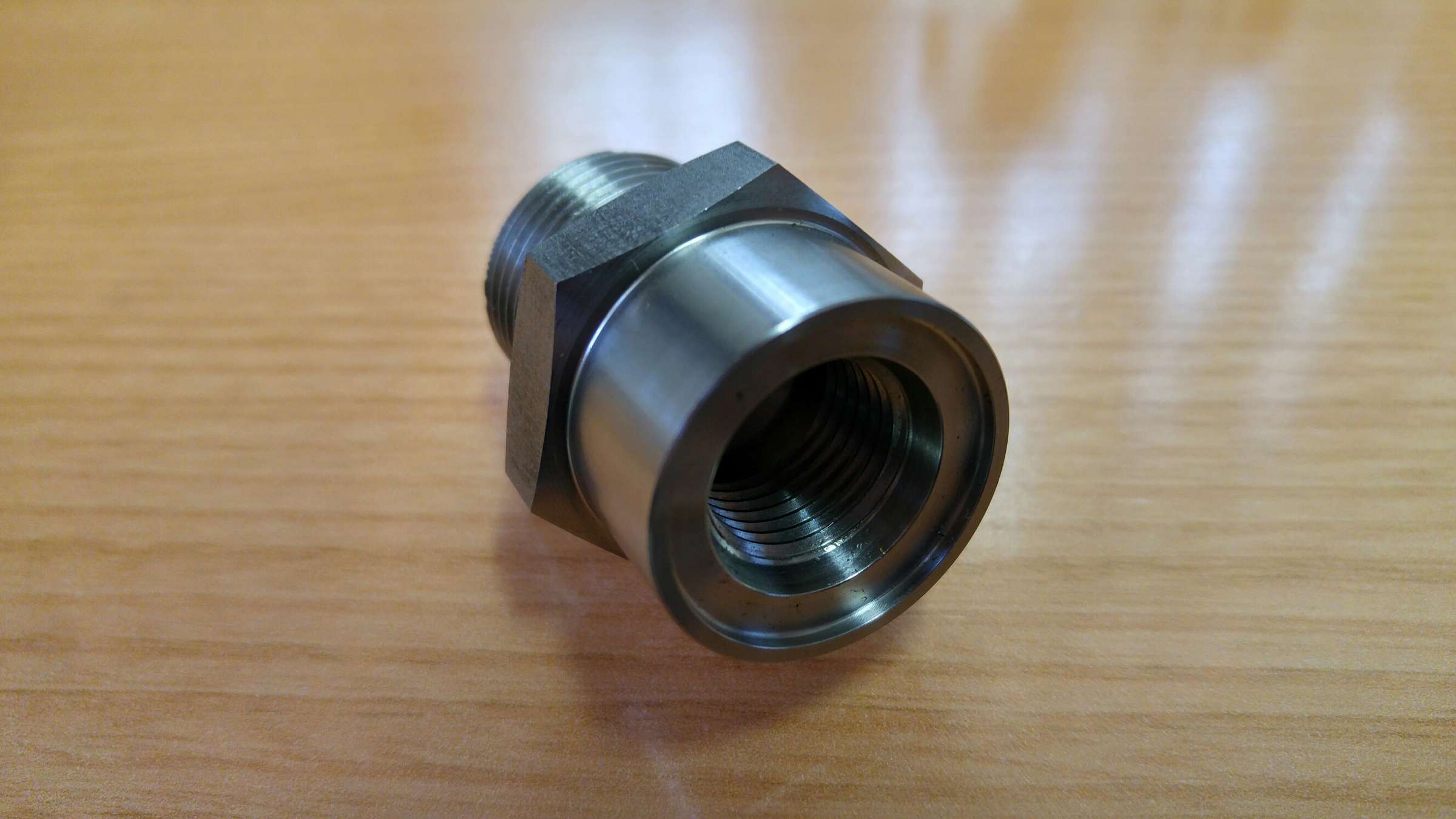 Stutzen M24 / M16x1.5 SW30 L=40 1.4571