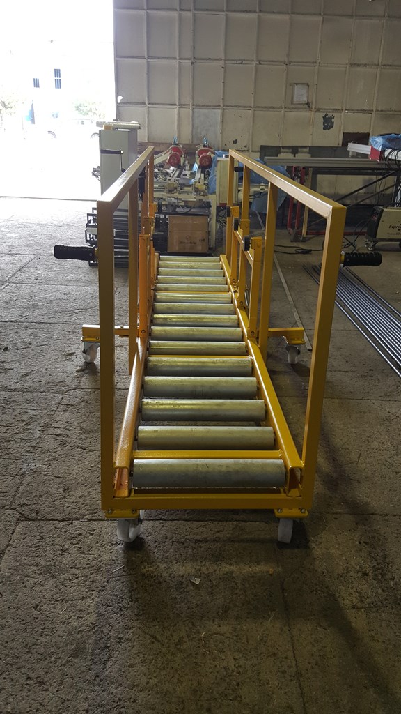 Sheet moving conveyor