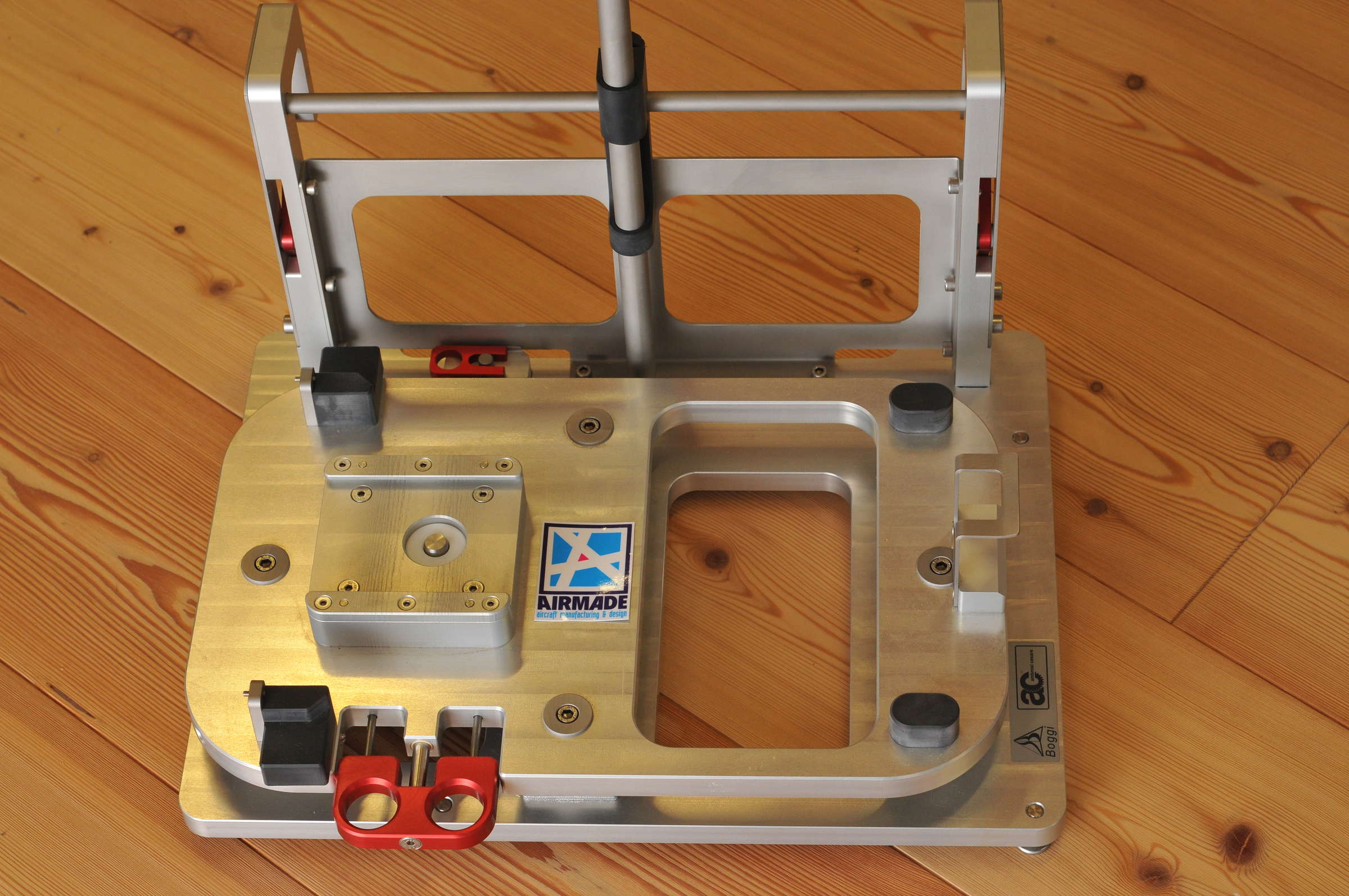 Defibrillator support installed on aircraft