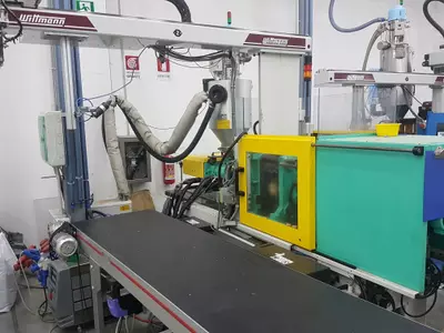 320 GE + robot Witmann
