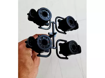 Automotive overmolded coils