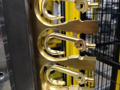 Bag hook in brass milled from block