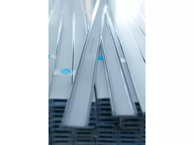 ABS and PVC profiles co-extruded with metal inlet