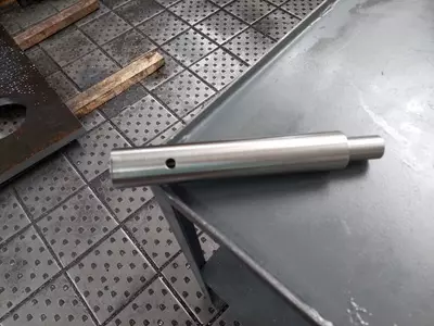 Turned shaft with bore