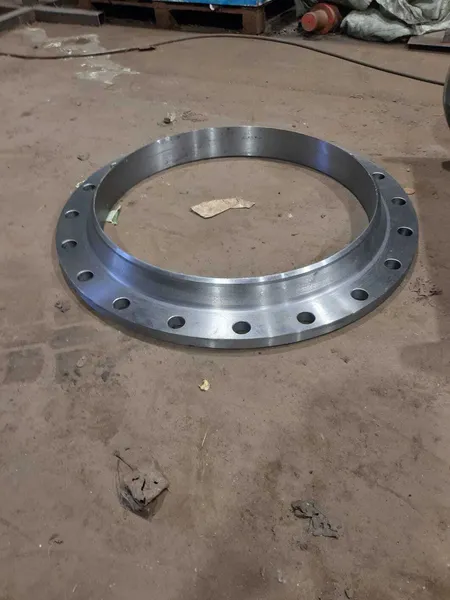 Milled flange with holes
