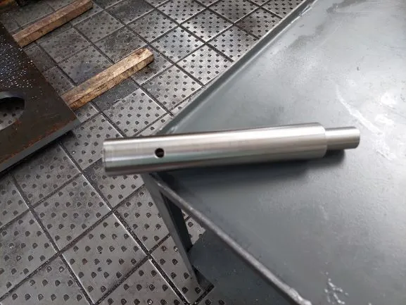 Turned shaft with bore