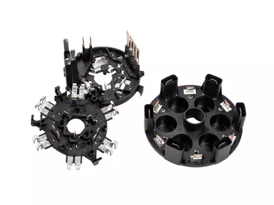 Spritzgussartikel, Einlegeteilen umspritzt