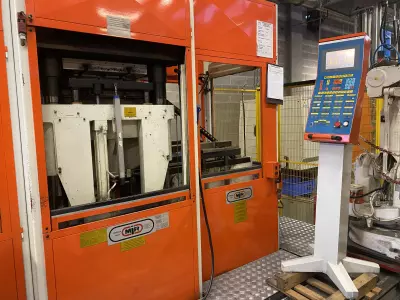 Pressa iniezione verticale