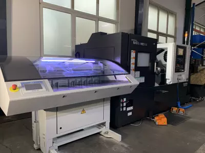 CNC-Drehmaschine mit Gegenspindel, AGW und Stangenlader