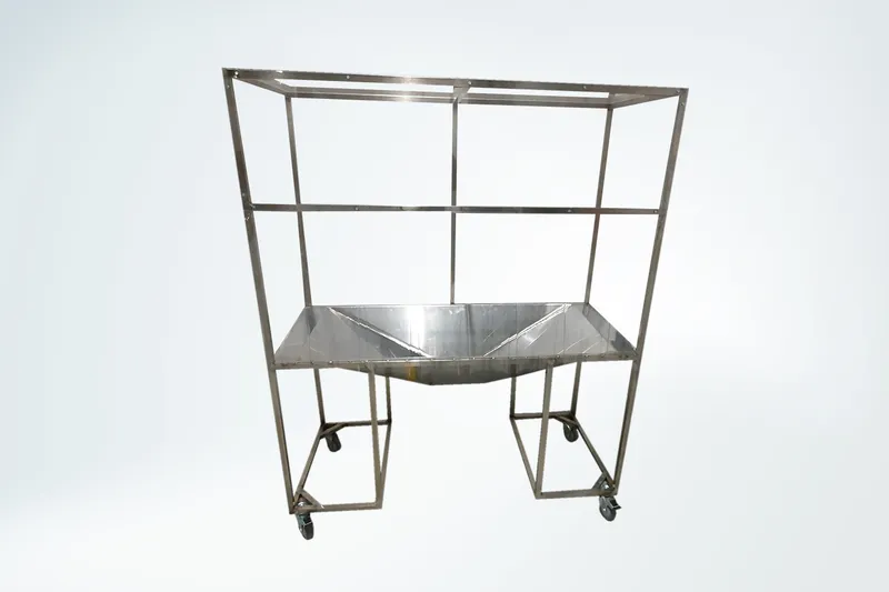 Inox trolley with funnel made of inox sheet metal.