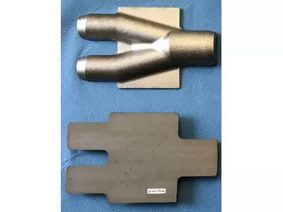 Schmiedestück mit Faserverlauf (grain flow) am Beispiel eines Hosenrohrs mit Schweißflossen