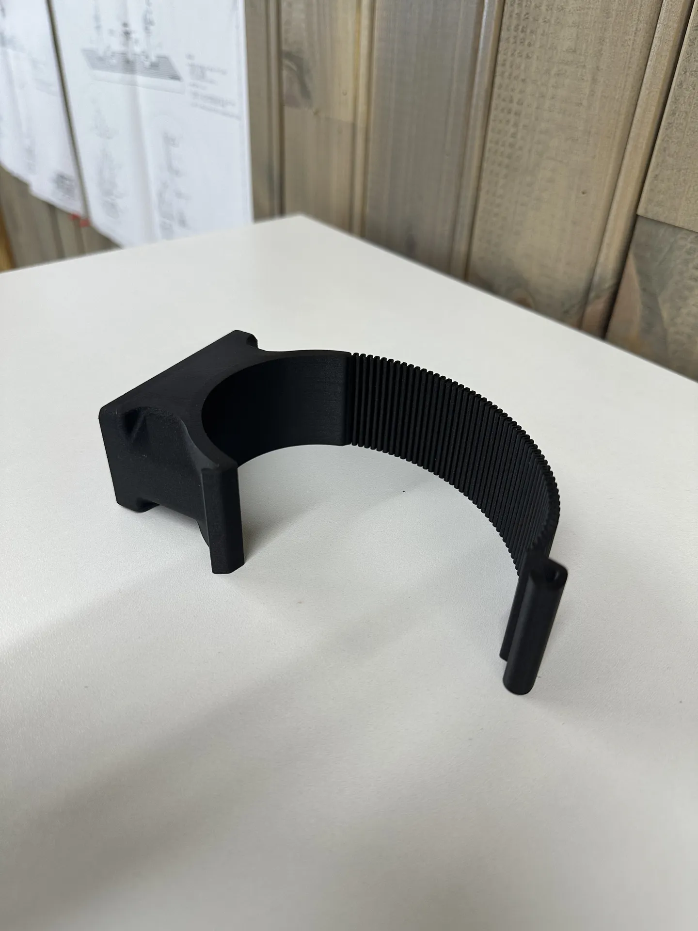 Casing with flexible strap