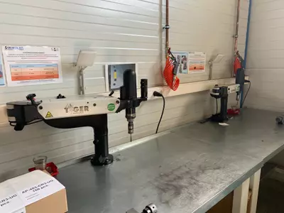 Thread cutting machine