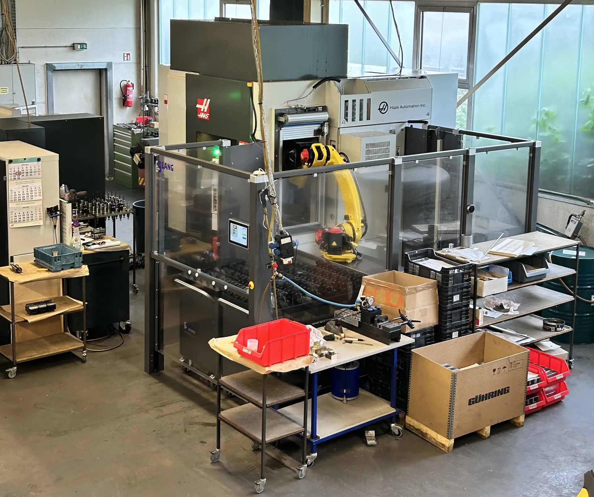 UMC750-SS with Lang-Technik Robotrex Automation