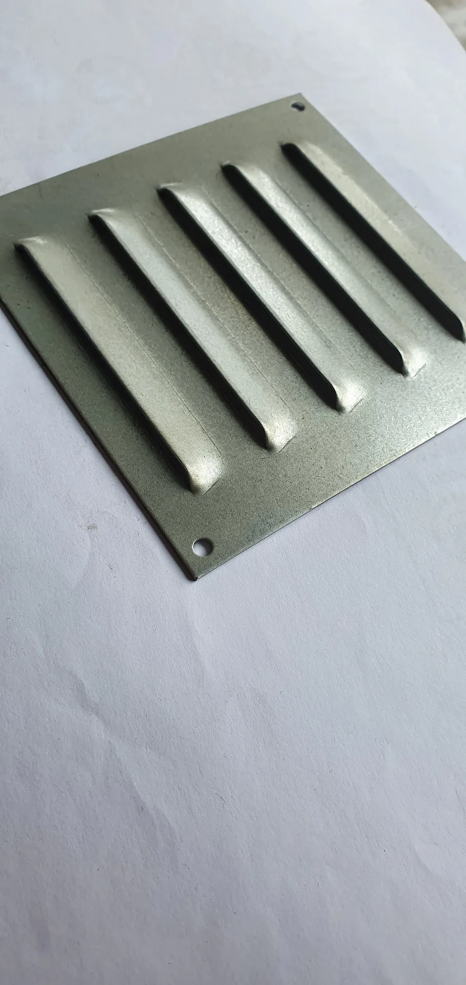 punching louvres