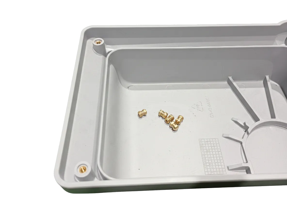 Lighting housing - Insert overmolding