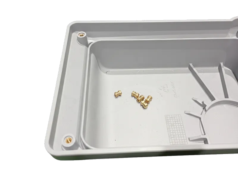 Lighting housing - Insert overmolding
