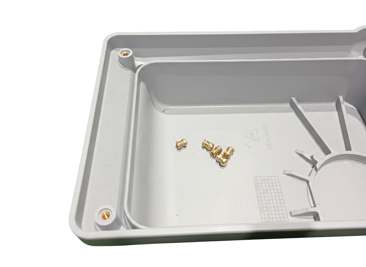 Lighting housing - Insert overmolding