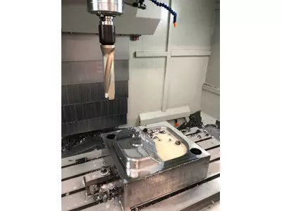 Rough milling and drilling before hardening.