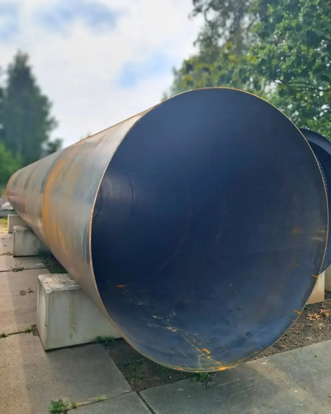 Rolled and welded large-diameter steel pipe
