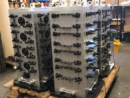 Four-sided tombstone fixture tower