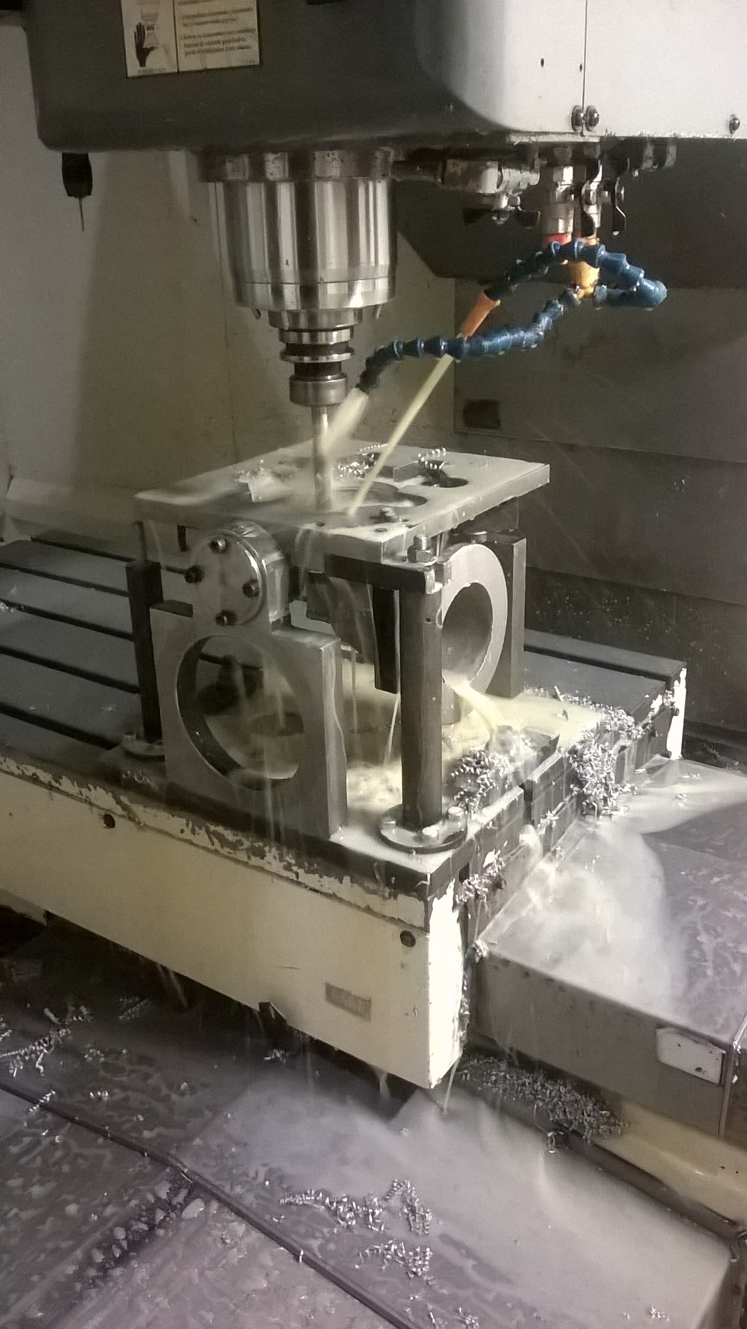 Fuel tank trucks filling pump part (cast aluminium) machining on a customs made jig